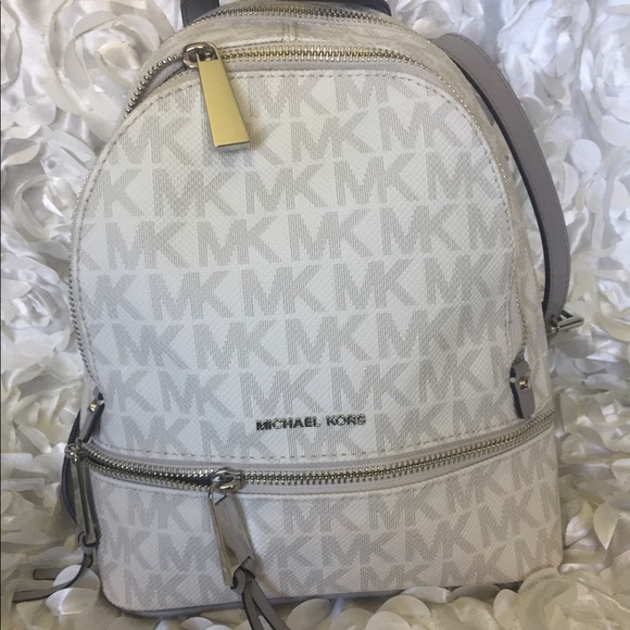 Michael Kors Handbags - Micheal Kors Monogram backpack